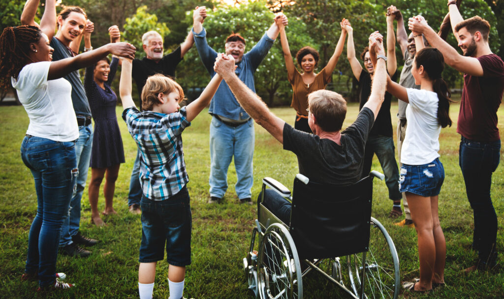 A group of people with developmental disabilities or Autism participating in the community.